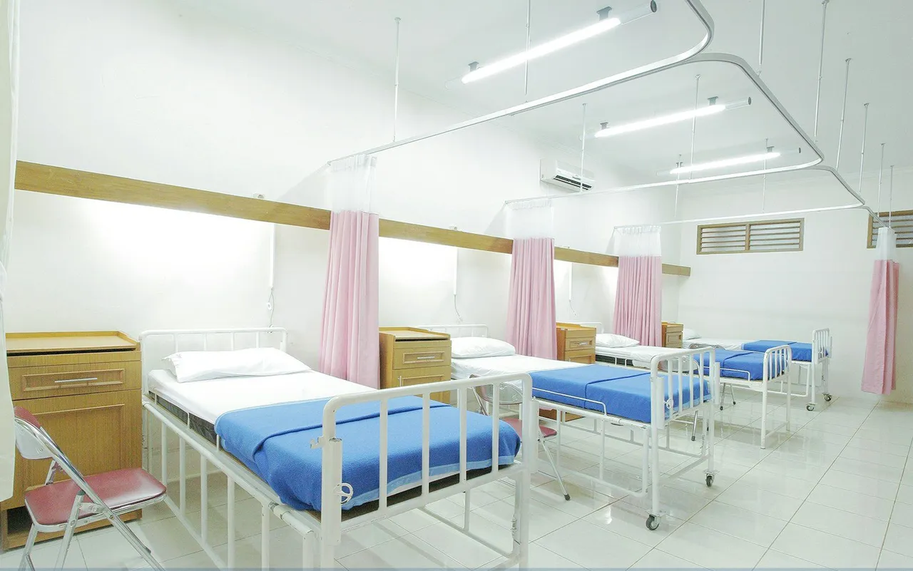 Brightly lit modern hospital corridor — East Dammam / ممر مستشفى حديث — شرق الدمام
