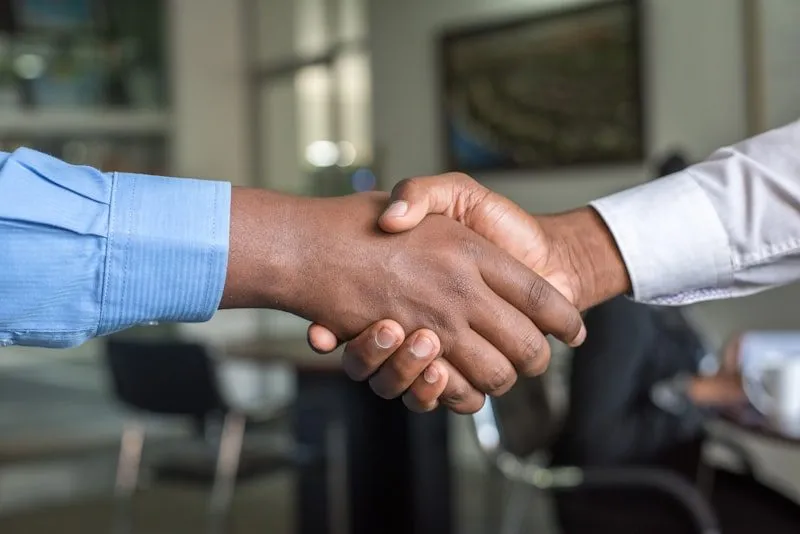 Business handshake at meeting